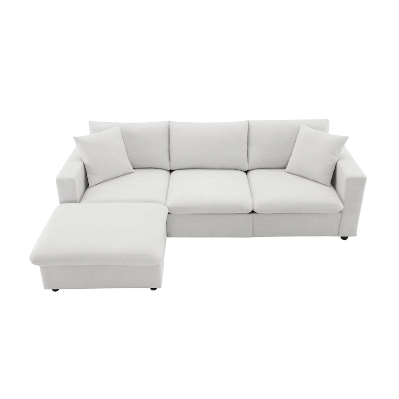 Divano componibile a forma di L con cuscini, pouf e seduta larga