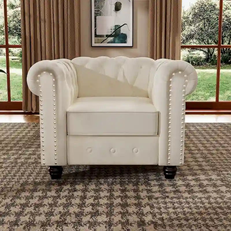 Poltrona Chesterfield in velluto Morden Fort, poltrona imbottita con bottoni, borchie e gambe in legno massello per soggiorno