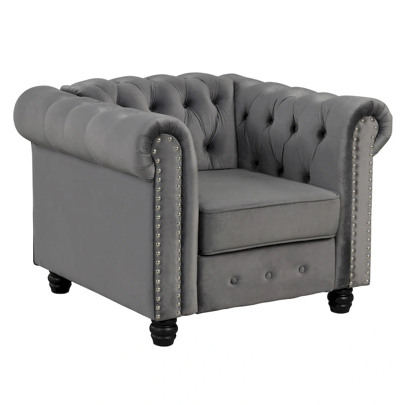 Poltrona Chesterfield in velluto Morden Fort, poltrona imbottita con bottoni, borchie e gambe in legno massello per soggiorno