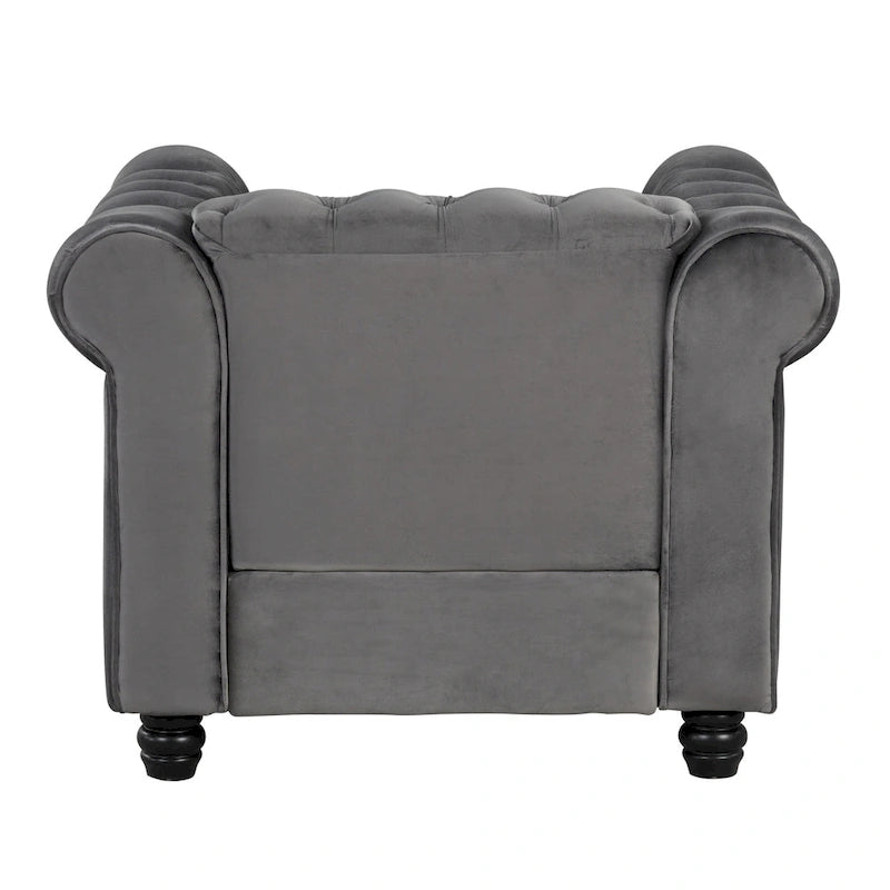 Poltrona Chesterfield in velluto Morden Fort, poltrona imbottita con bottoni, borchie e gambe in legno massello per soggiorno