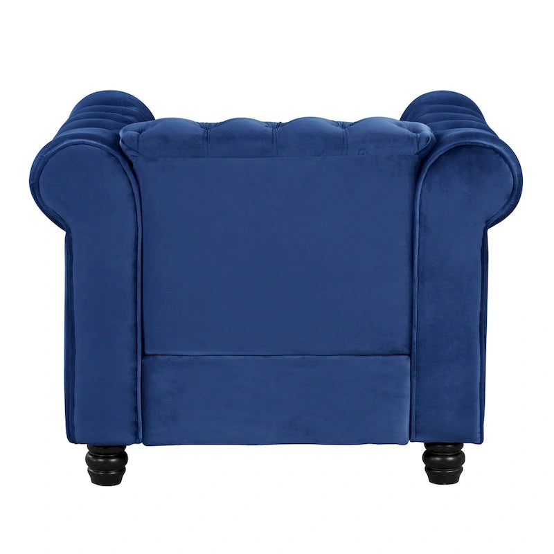 Poltrona Chesterfield in velluto Morden Fort, poltrona imbottita con bottoni, borchie e gambe in legno massello per soggiorno