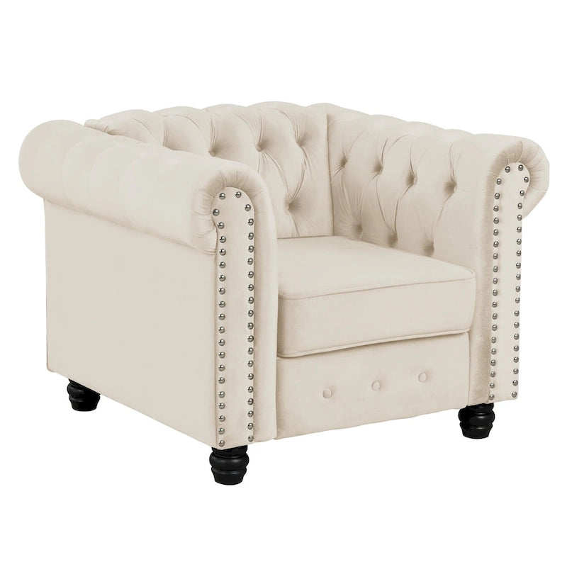 Poltrona Chesterfield in velluto Morden Fort, poltrona imbottita con bottoni, borchie e gambe in legno massello per soggiorno