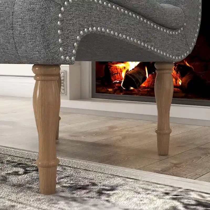 Poltrona imbottita con braccioli per camera da letto e soggiorno, con gambe in legno